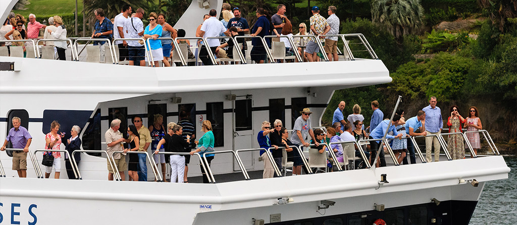 An interior of the Magistic Two showcasing its size, multi-deck layout and unobstructed harbour views.