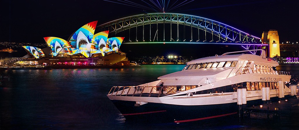 The Magistic Vivid Sydney Cruise, with the Sydney Harbour Bridge and Opera House in the background