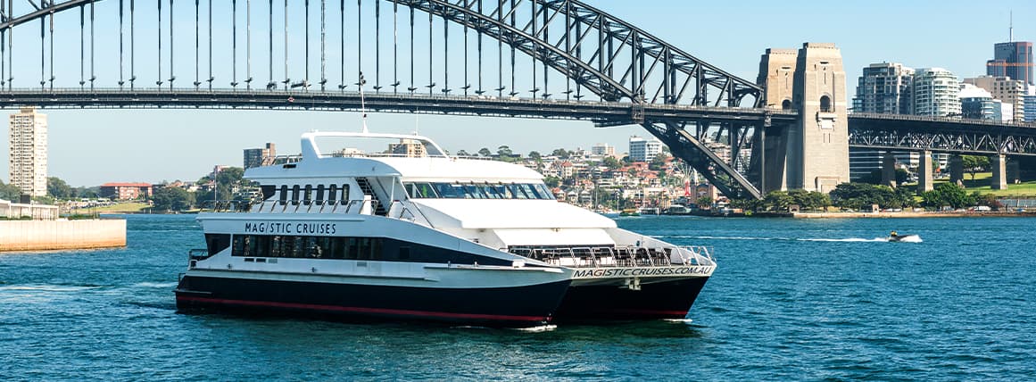 Cruise under the mighty Sydney Harbour Bridge aboard the Magistic long lunch cruise.