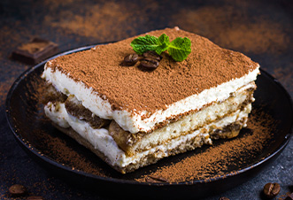 End your dining experience on a high note with our speically prepared Tiramisu