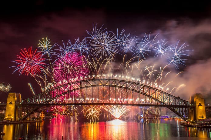 The colourful and vibrant Sydney NYE fireworks displays burst into the sky at 9pm and midnight on Sydney Harbour
