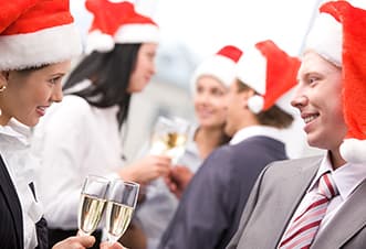 Guests enjoying Christmas day with drinks on Magistic Christmas Day cruise on Sydney Harbour