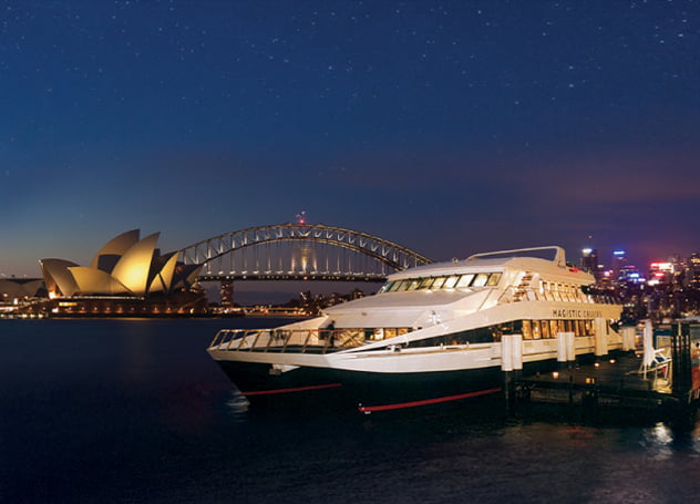 Surreal night views of Sydney Harbour aboard the Magistic dinner cruise