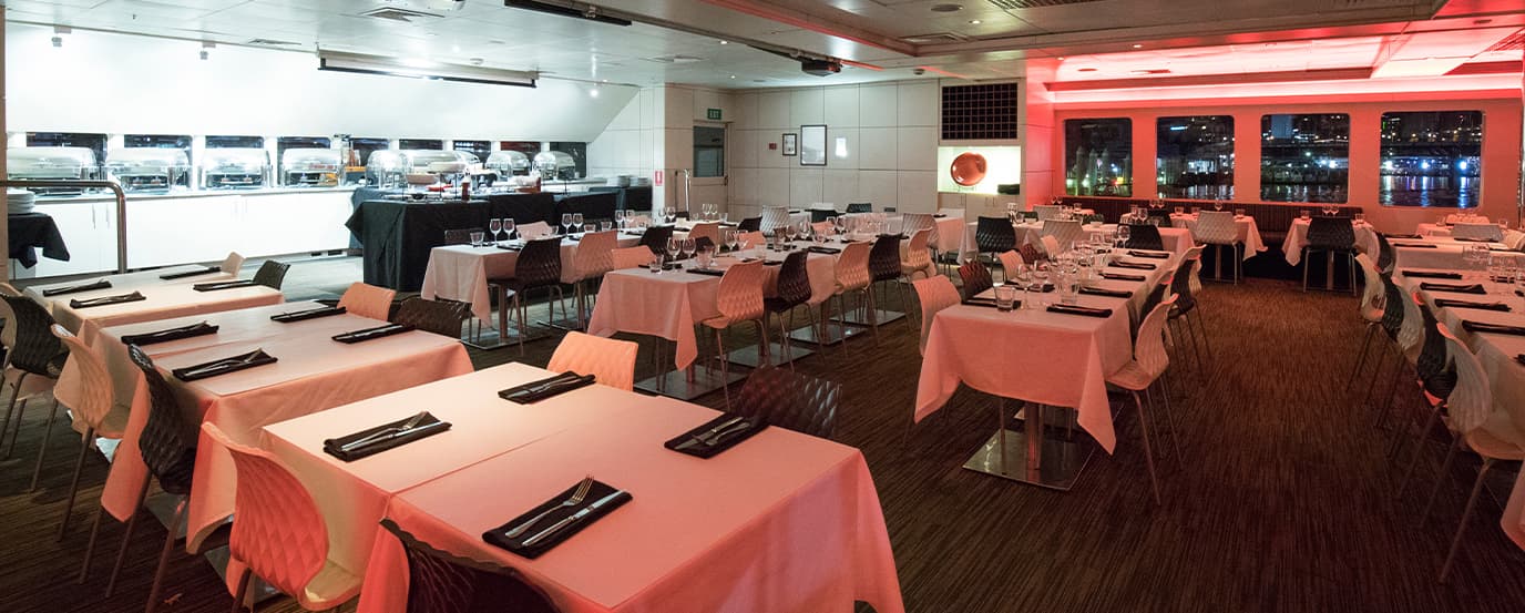 Formal dining saloon with buffet station and panoramic windows on the Magistic