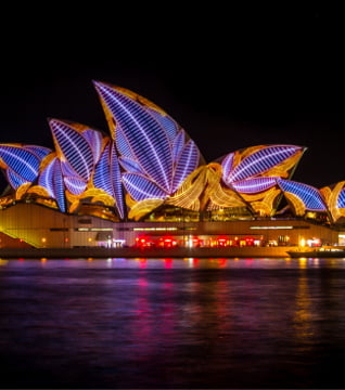 Witness the Lighting of The Sails of the Opera House from the expansive outer decks of the Magistic